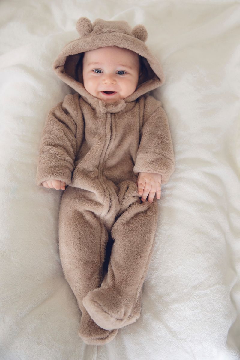 LEVES DEFEITOS - MACACÃO FLEECE ZÍPER 2 VIAS COM PÉ URSO BEGE
